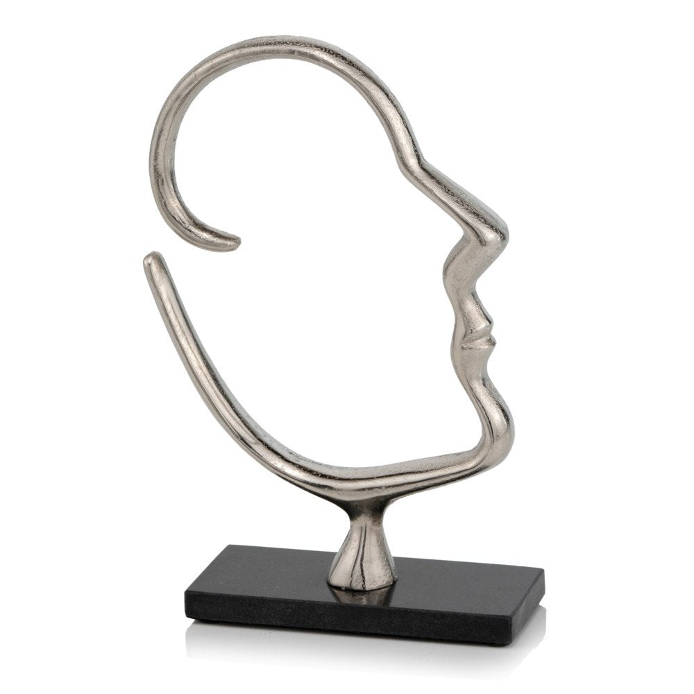 human face sculpture from left side