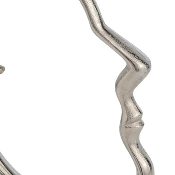 human face sculpture x2 close up